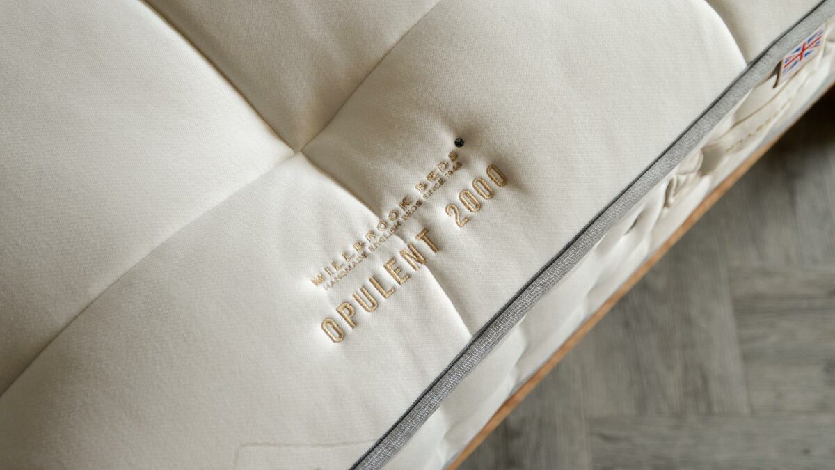 opulent 2000 logo embroidered close up