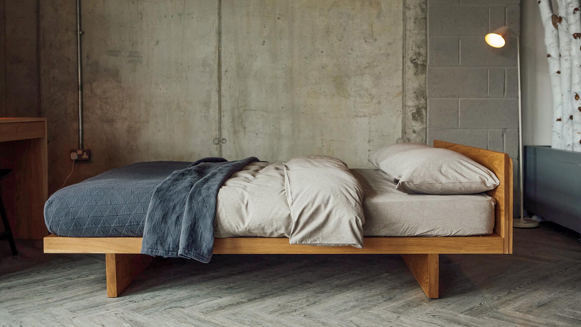 Side view of our Kyoto bed in Oak. Available to order in a choice of solid wood and a range of sizes.