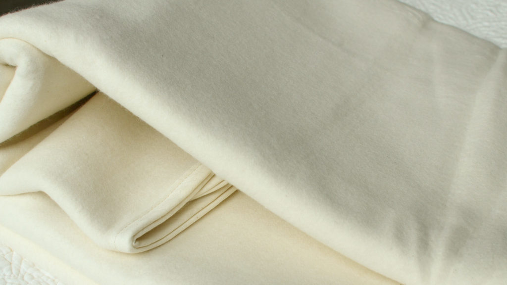 Undyed organic cotton mattress protector