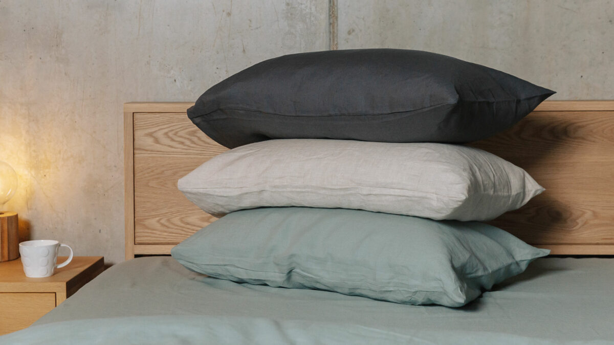 organic linen bedding - a stack of pillows showing the 3 colour options