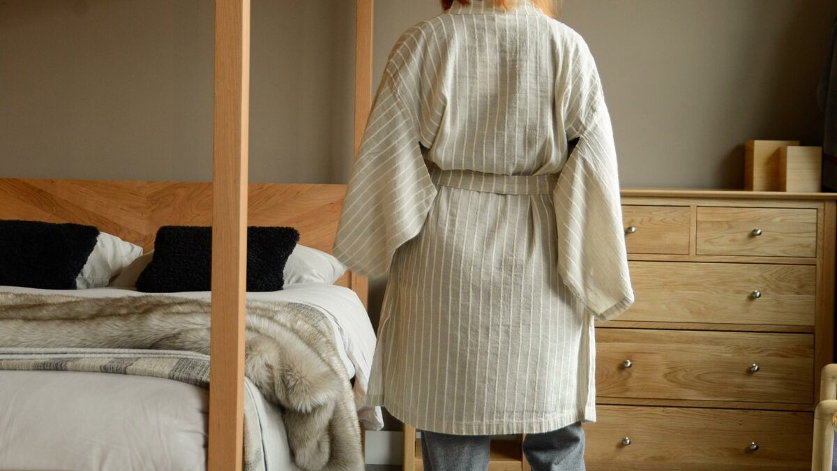 organic linen kimono dressing gown in beige with ivory stripes shown from the back