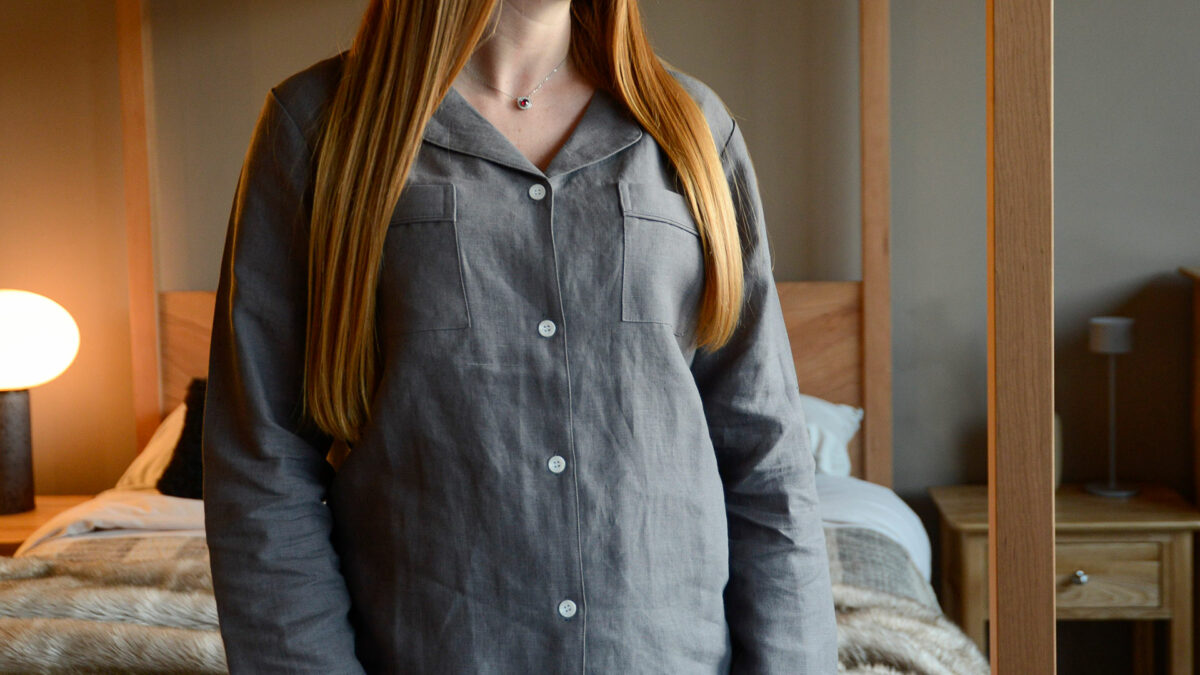 organic linen pyjamas in charcoal grey shown on a model