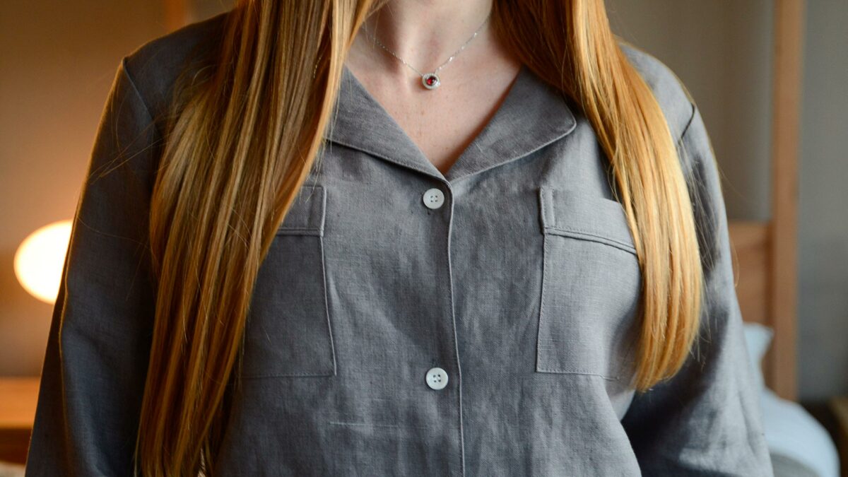 organic linen pyjamas in charcoal grey a close up of the neckline
