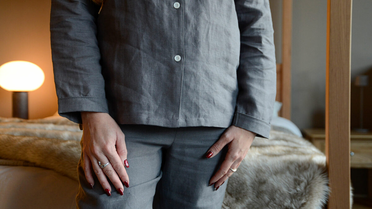 organic linen pyjamas in charcoal grey shown in close up