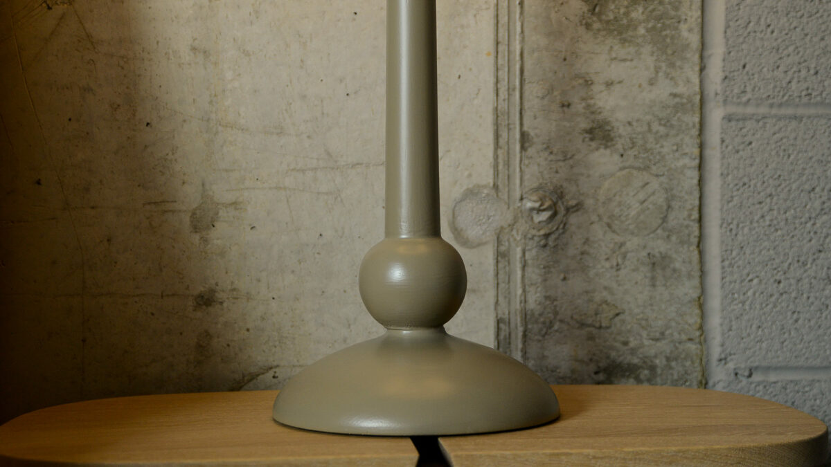 A close up view of our dark taupe painted wooden lamp base