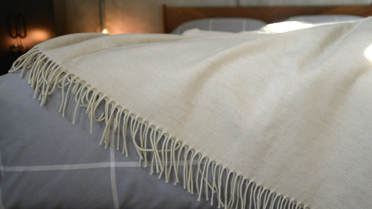 pure merino herringbone throw in cream