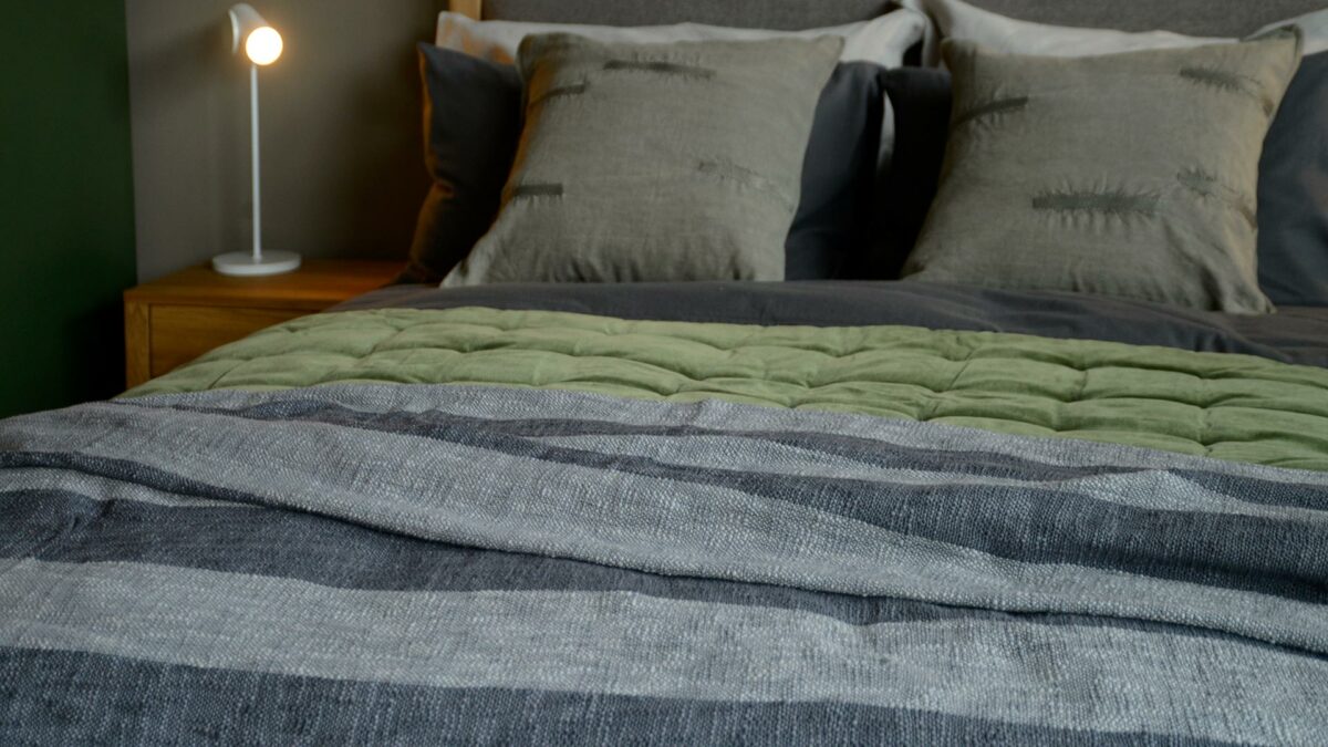 pale grey and dark grey striped throw