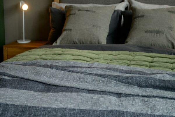 pale grey and dark grey striped throw
