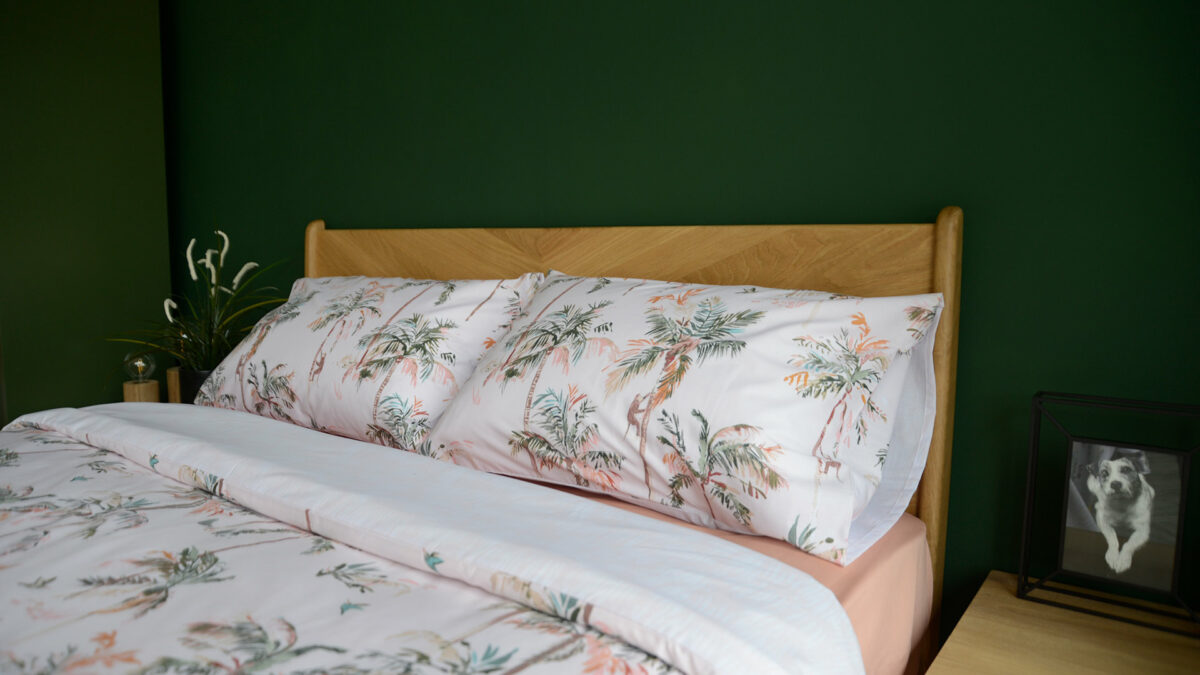 pale pink duvet set with dark green palm tree print 1920