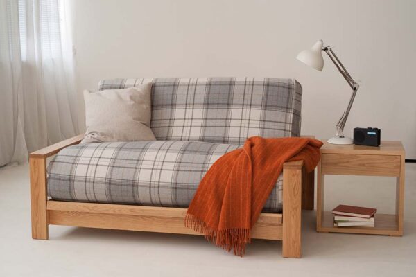 Panama Oak framed futon sofa bed, the futon has a Bainbridge grey loose cover in wool