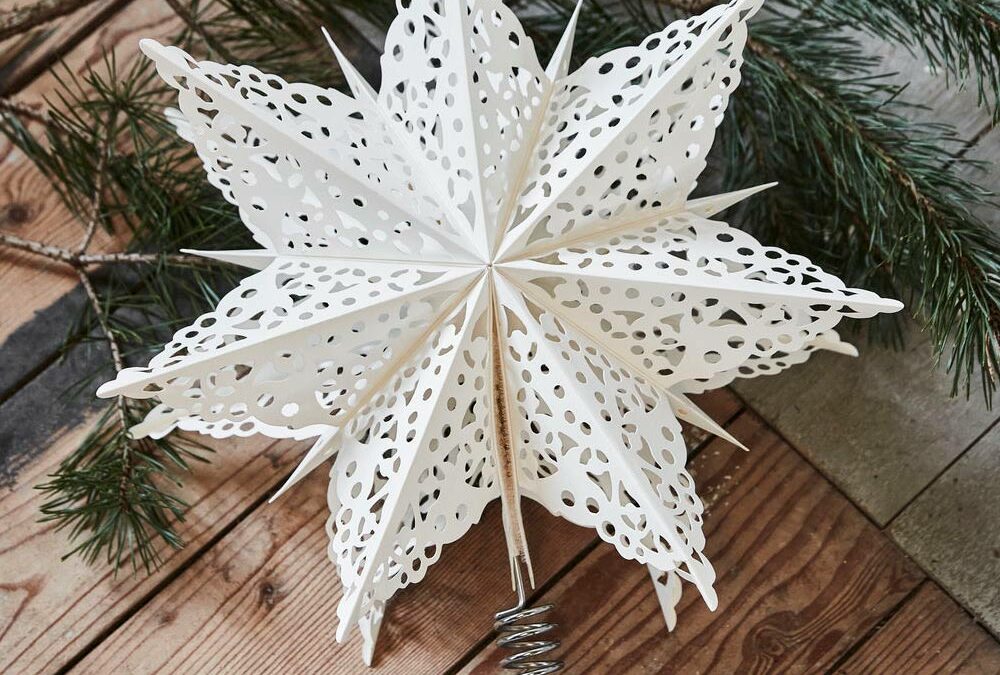 paper fold out star xmas tree topper decoration with cut-out lace pattern