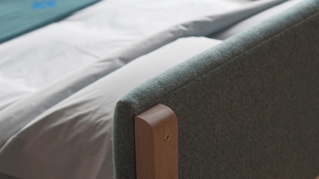 pure wool upholstered headboard back detail