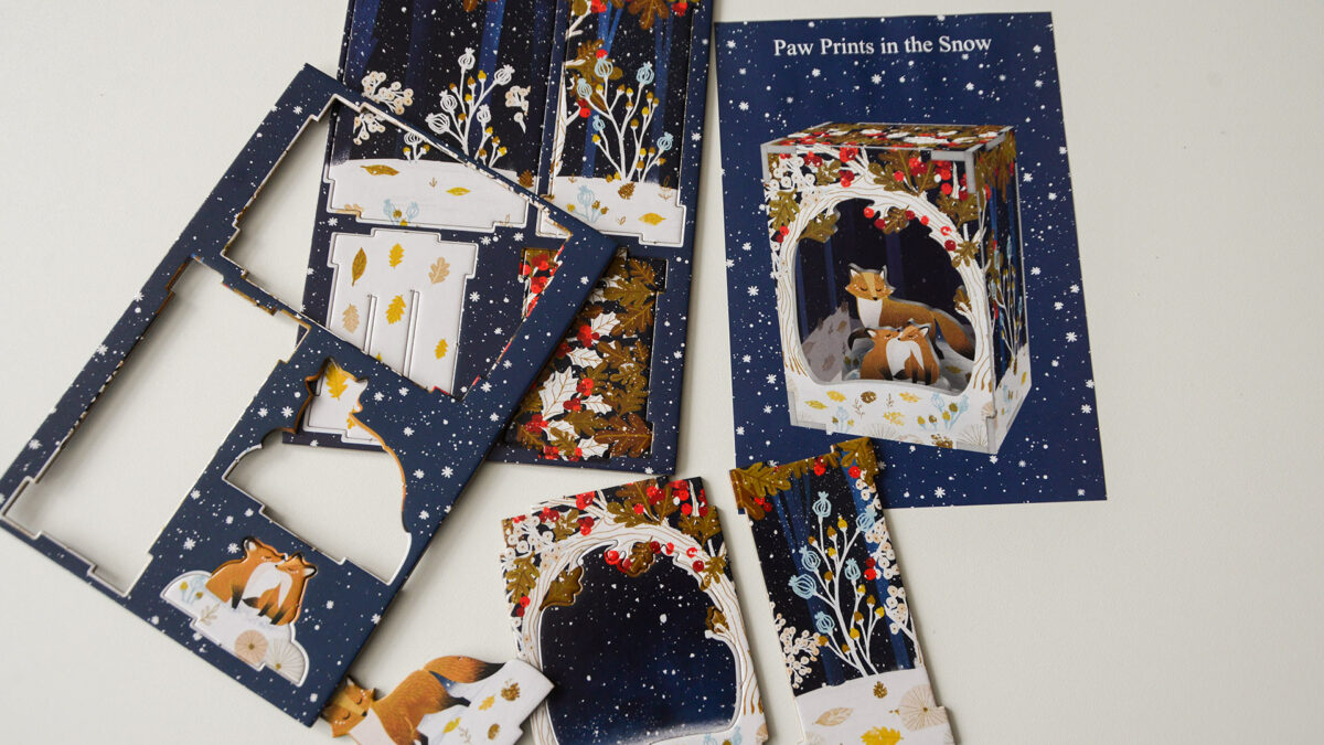 paw prints in the snow pack