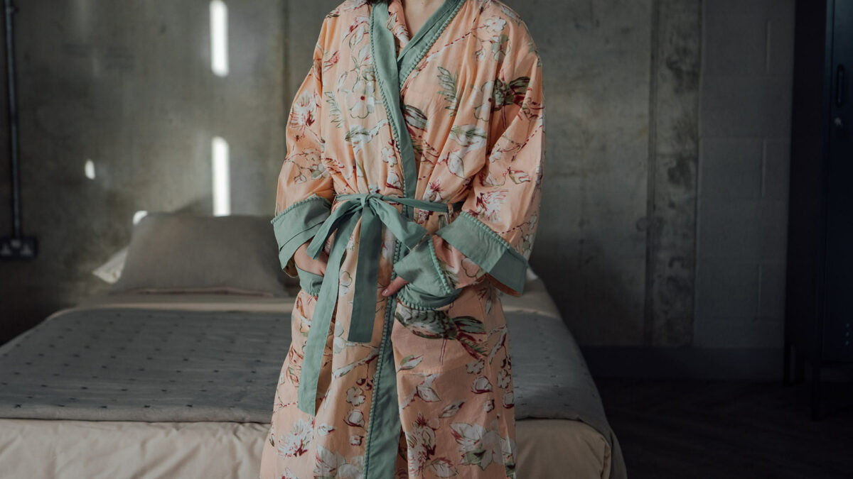 Peach floral light cotton dressing gown with green pompom edging