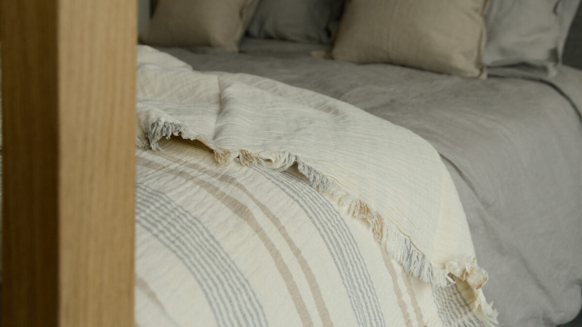 picnic pattern throw in ivory blue and taupe