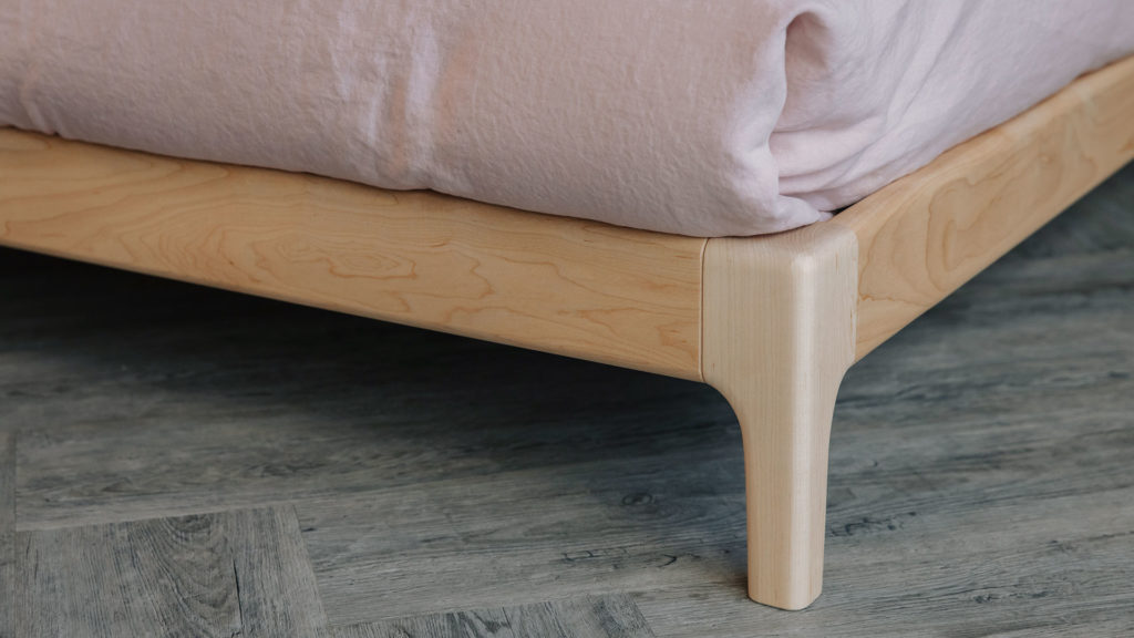 close up of low solid maple Pimlico bed leg