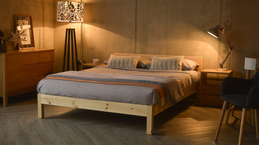 Cosy loft style bedroom featuring our pine sahara-nevada mix bed made from Pine