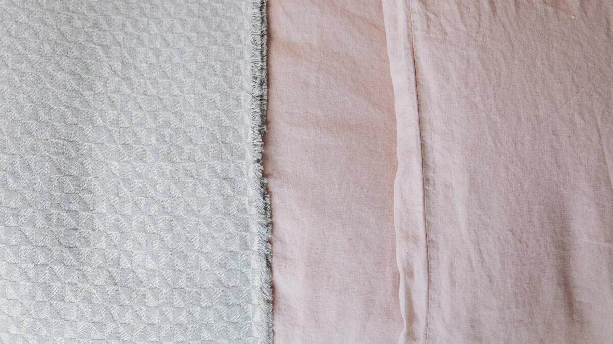 pink linen duvet cover with silver grey triangle pattern bedspread