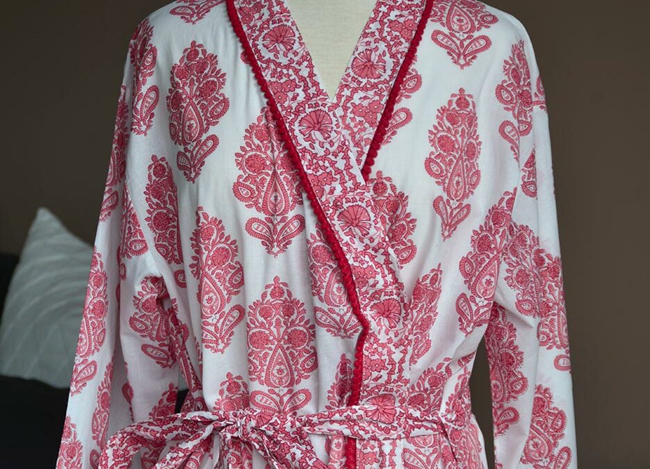 block print effect cotton robe in pink and white with pom-pom trim