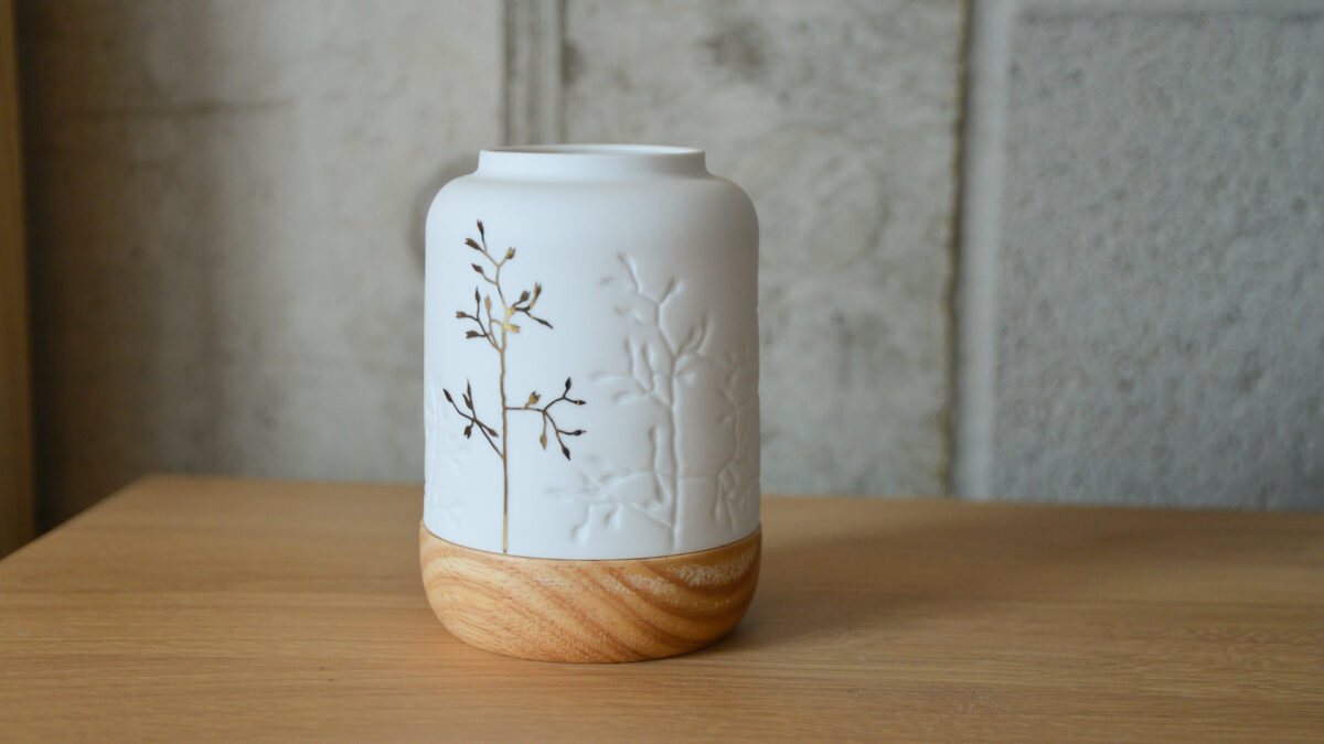 porcelain lantern with floral detail and gold decoration
