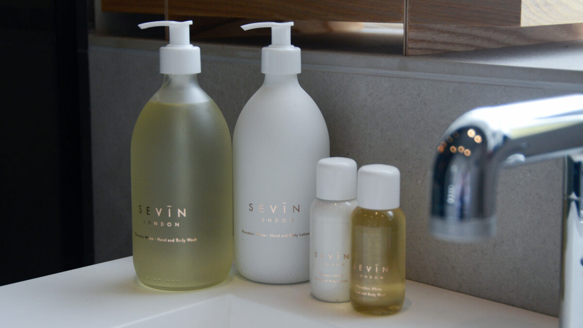 luxury natural and Paraben-free bathroom toiletries including liquid soap, oils and body lotion