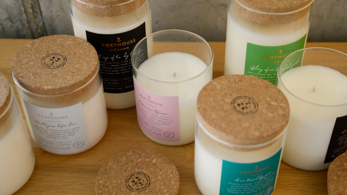 moments inspired scented candles in a glass jar with a cork lid that can be used as a coaster