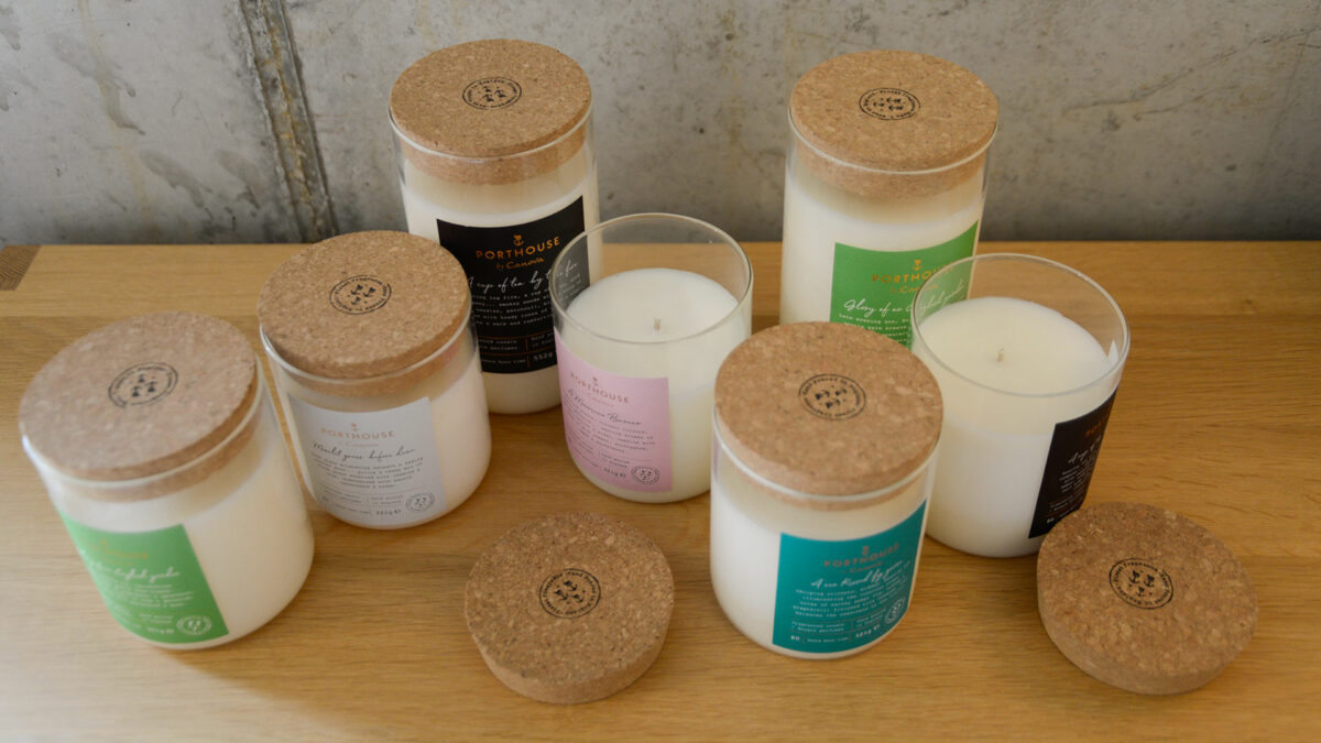 moments inspired scented candles in a glass jar with a cork lid that can be used as a coaster