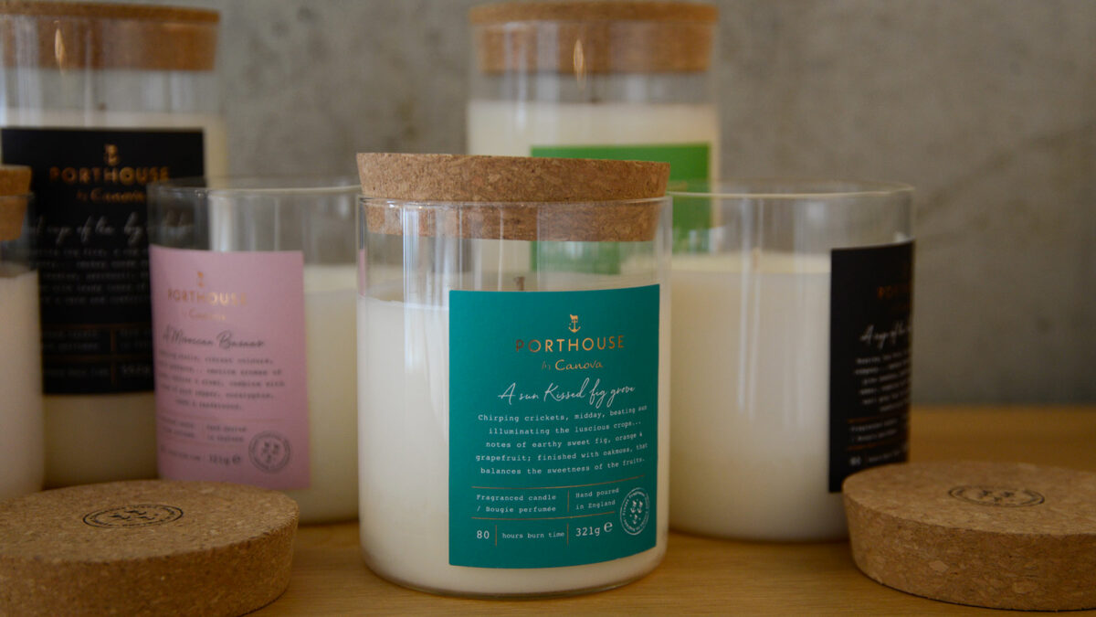 moments inspired scented candles in a glass jar with a cork lid that can be used as a coaster