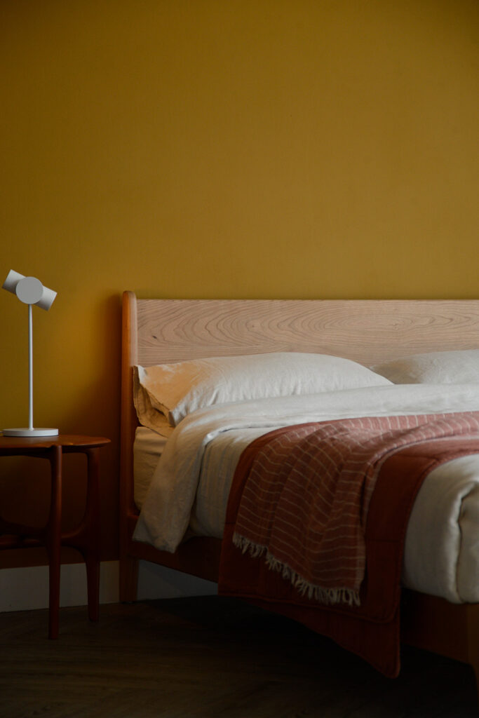 Our low mid century style Carnaby bed made from cherry wood a closer look at the headboard