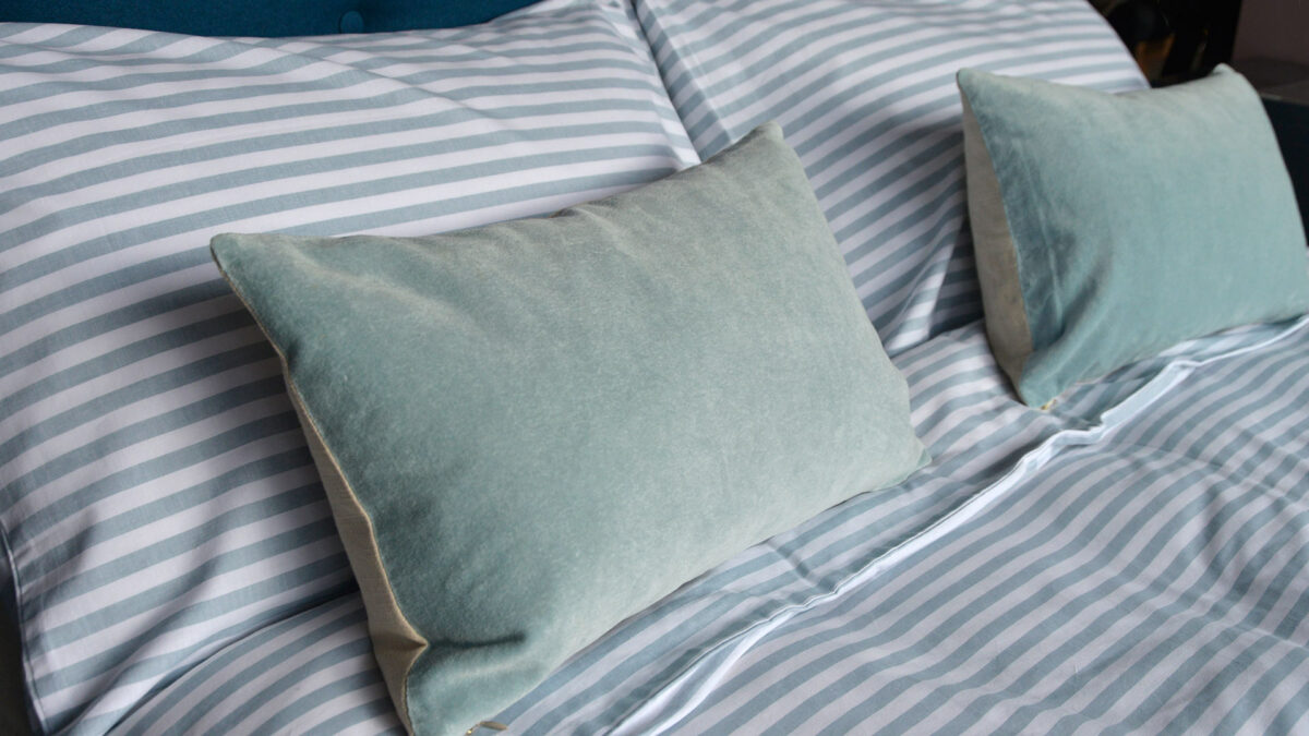 pyjama stripe duvet set with velvet cushions duck egg