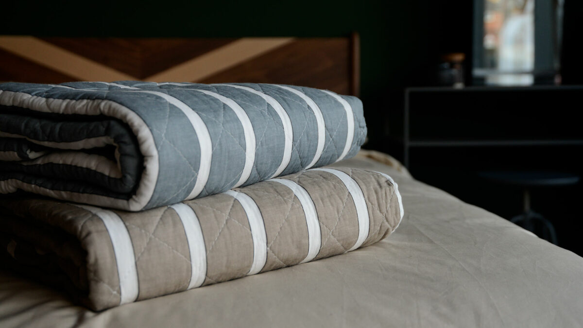 quilted throws with broad stripe pattern