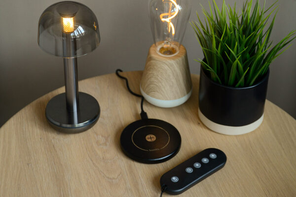 Humble Two lamp (Left) and Humble One lamp (Right) with remote control and wireless charging deck