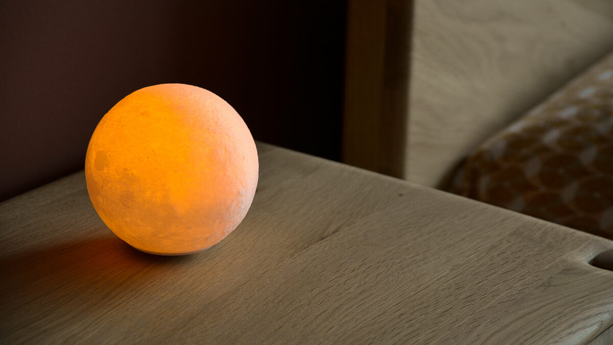rechargeable portable moon lamp by bed