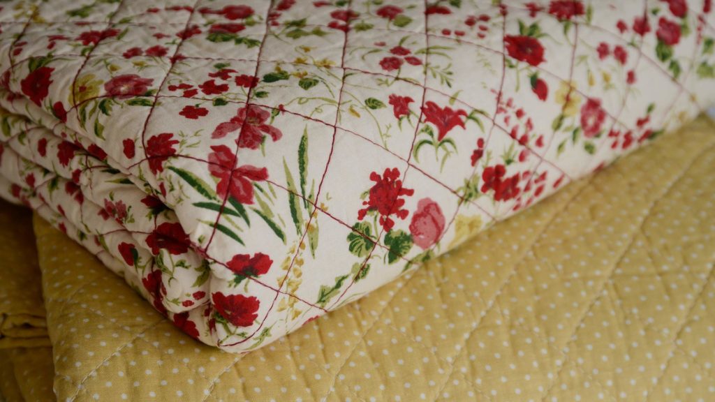 cotton quilted throw with floral print