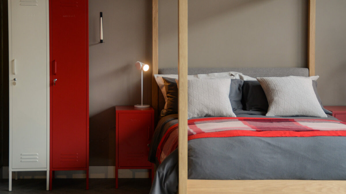 storage lockers in ivory and red shown with our Highland 4 poster bed