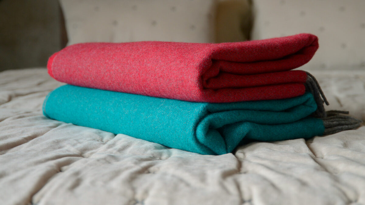 red or aqua merino lambswool throws