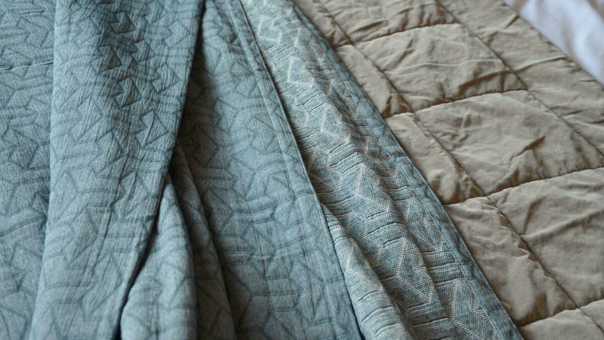 Petrol blue recycled cotton bedspread with stitched pattern