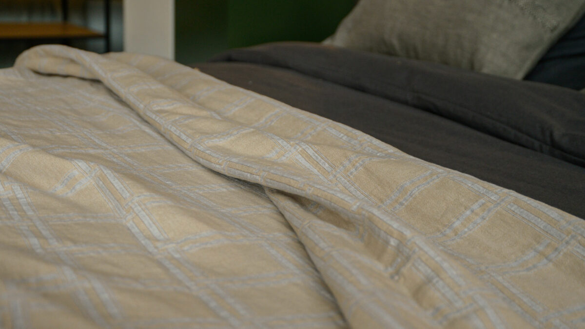 reversible check throw in organic cotton gold and silver grey