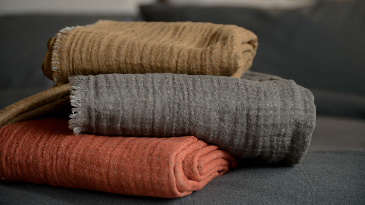 lightweight reversible cotton throws in earth tones