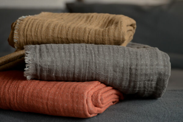 lightweight reversible cotton throws in earth tones