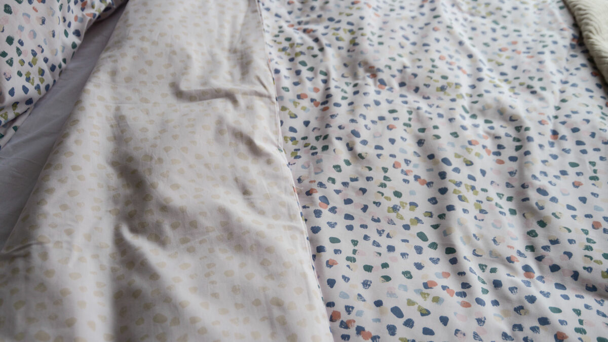 reversible cotton blend duvet cover set with pastel colours paint brush dots pattern, photo showing both sides