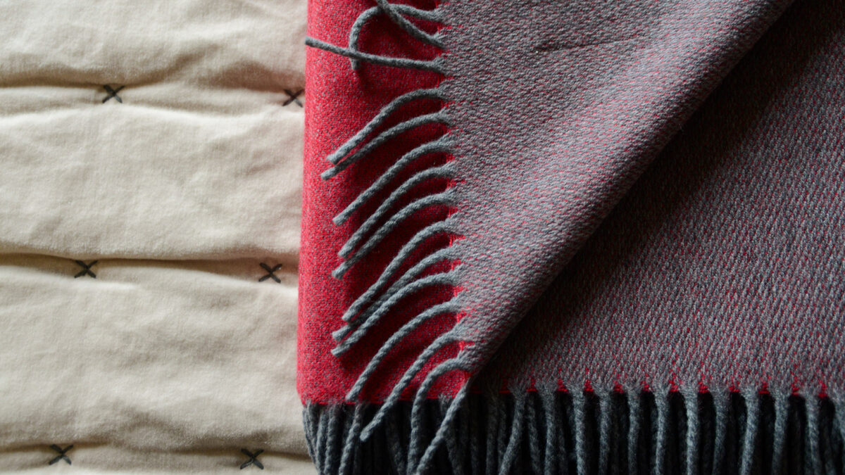 reversible merino throw red and mid grey