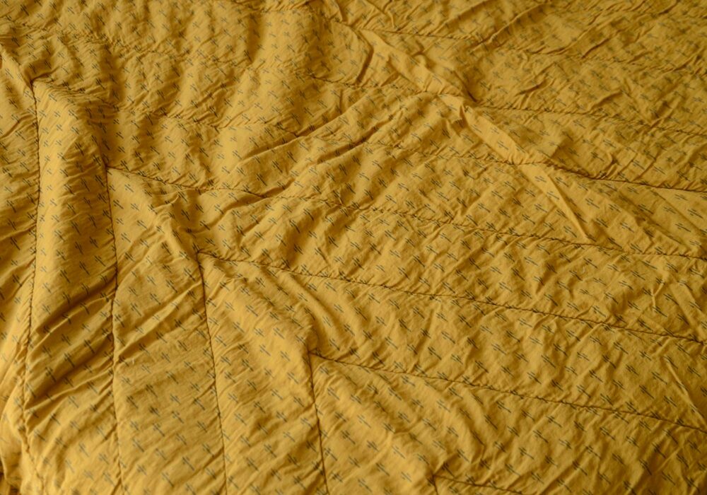 Reversible Quilted Throws Grey or Turmeric Natural Bed Company