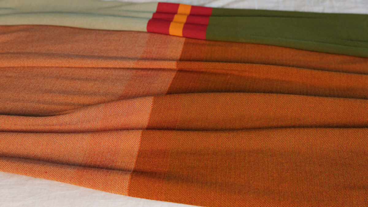 reversible throw with deep orange back