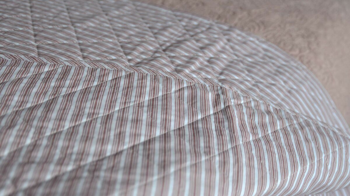 rose multi stripe quilted throw