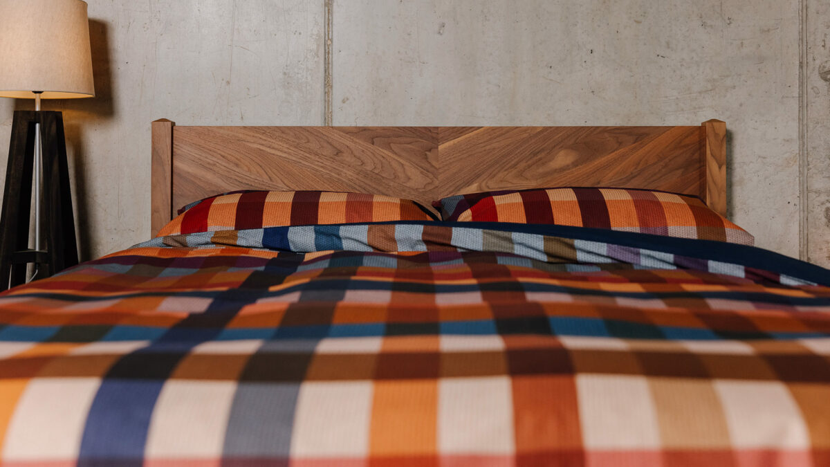 russet check duvet set on walnut Dalston bed
