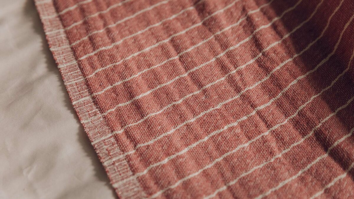rust red striped throw detail