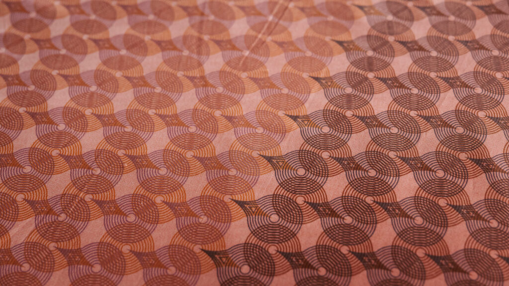 rusty reds circel print bedding detail