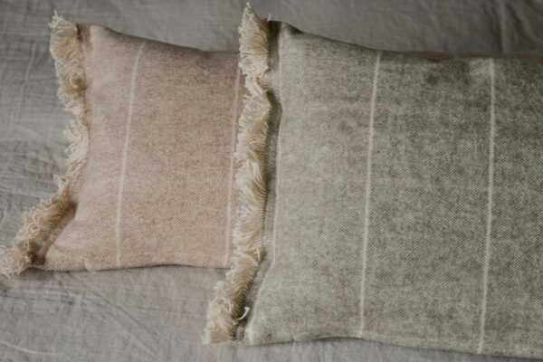 soft touch striped rectangular cushions in a choice of sage green or terracotta and cream