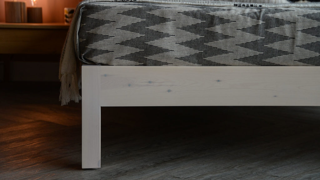 A closer view of the white wash pine Sahara bed frame leg